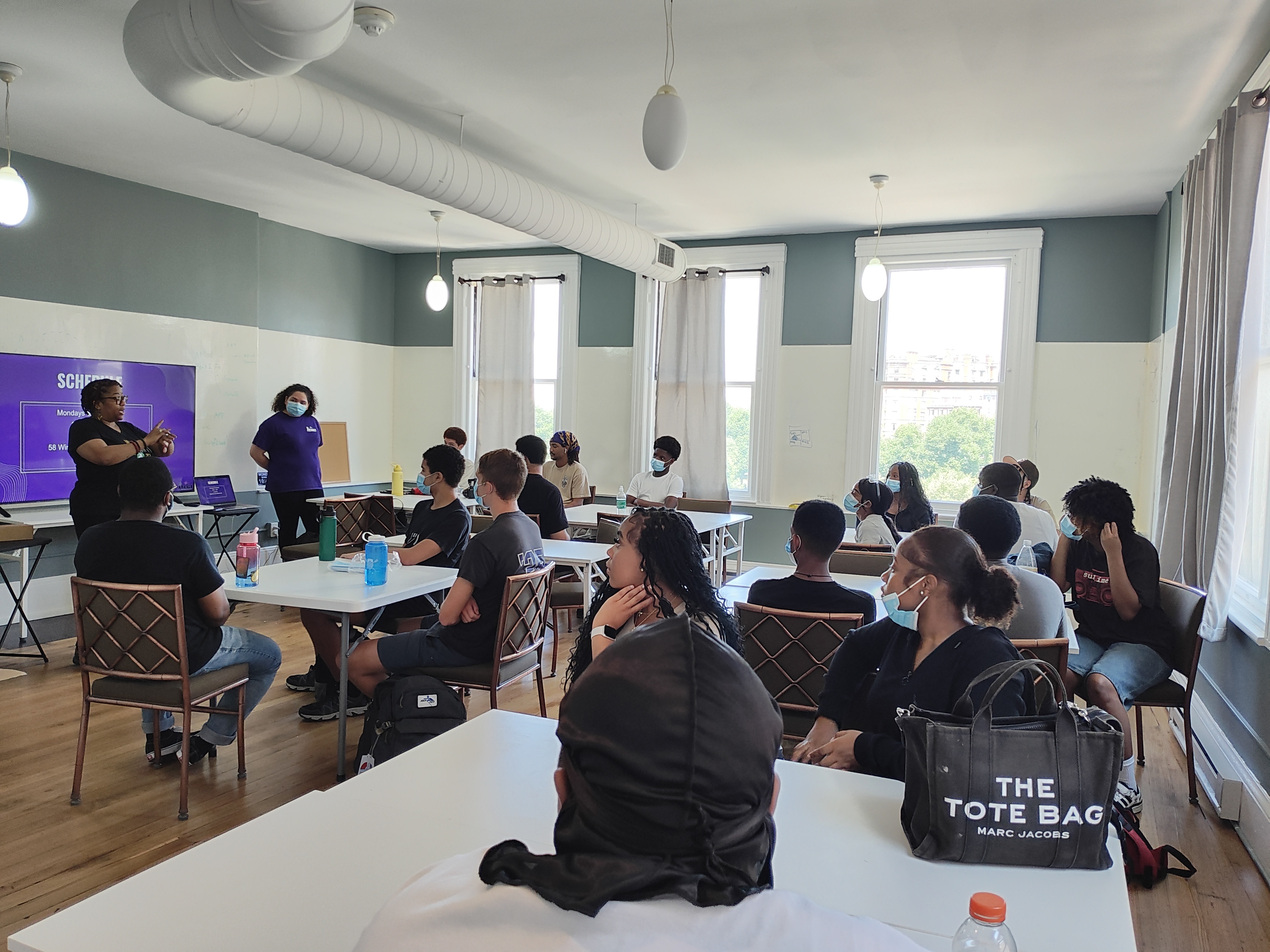 Youth and Young Adults in the Resilience Builder Summer Program in Next Leadership Development's training room.