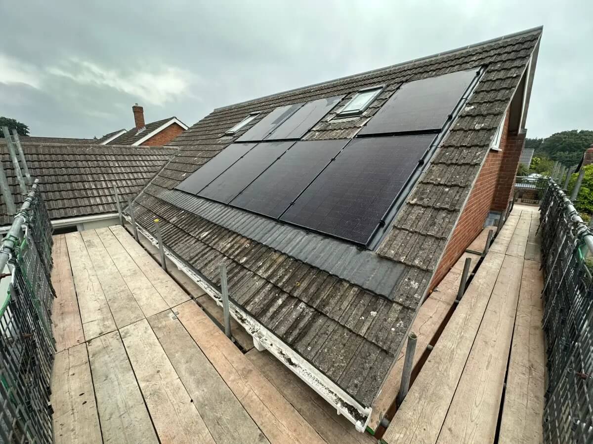 Full re-roof in progress — Roof tiles and battens with new ridge tiles