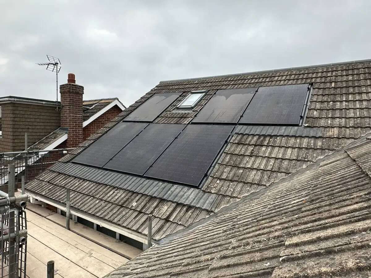 Full re-roof in progress — New roof tiles with new ridge tiles