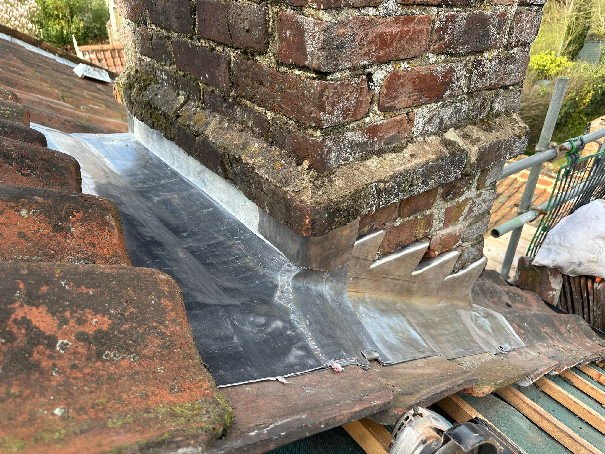 New re-roof with new back gutters on chimneys, new lead and new pots — Lead bossing and welding to a pitched roof