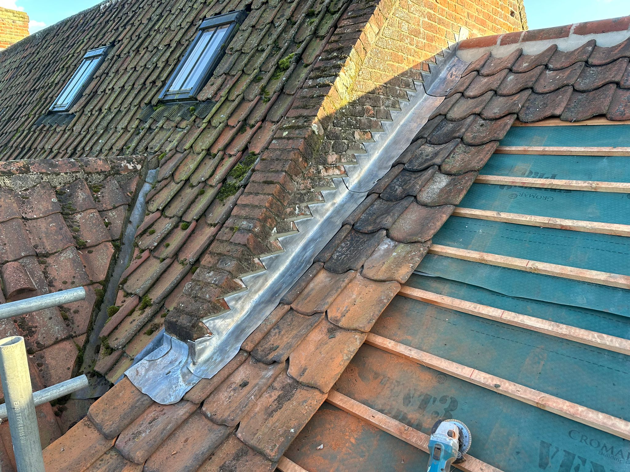 New re-roof with new back gutters on chimneys, new lead and new pots — Fine lead detailing to a pitched roof