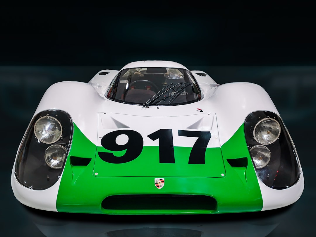 Front view of a classic Porsche 917 racing car with a green and white colour scheme Bath Digital Marketing Agency
