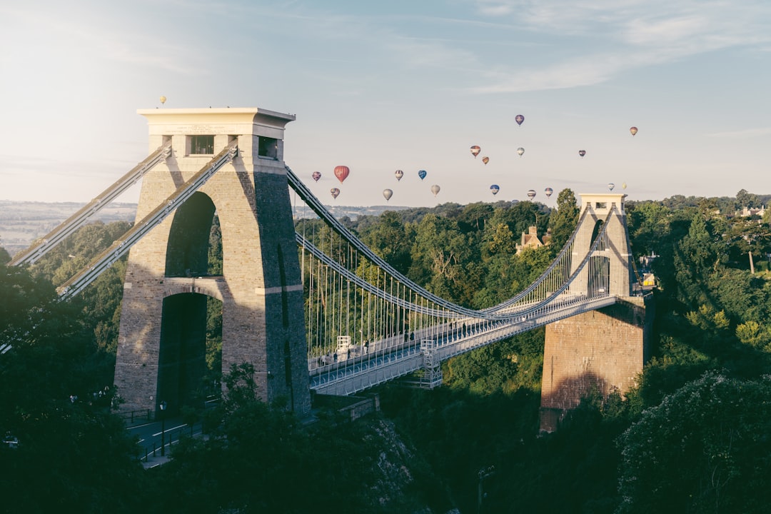 Clifton Suspension Bridge in Bristol with hot air balloons floating in the sky. Bath Digital Marketing Agency