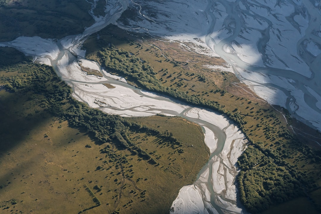 Bird's-eye perspective of a river system meandering through fields and forests. Bath Digital Marketing Agency