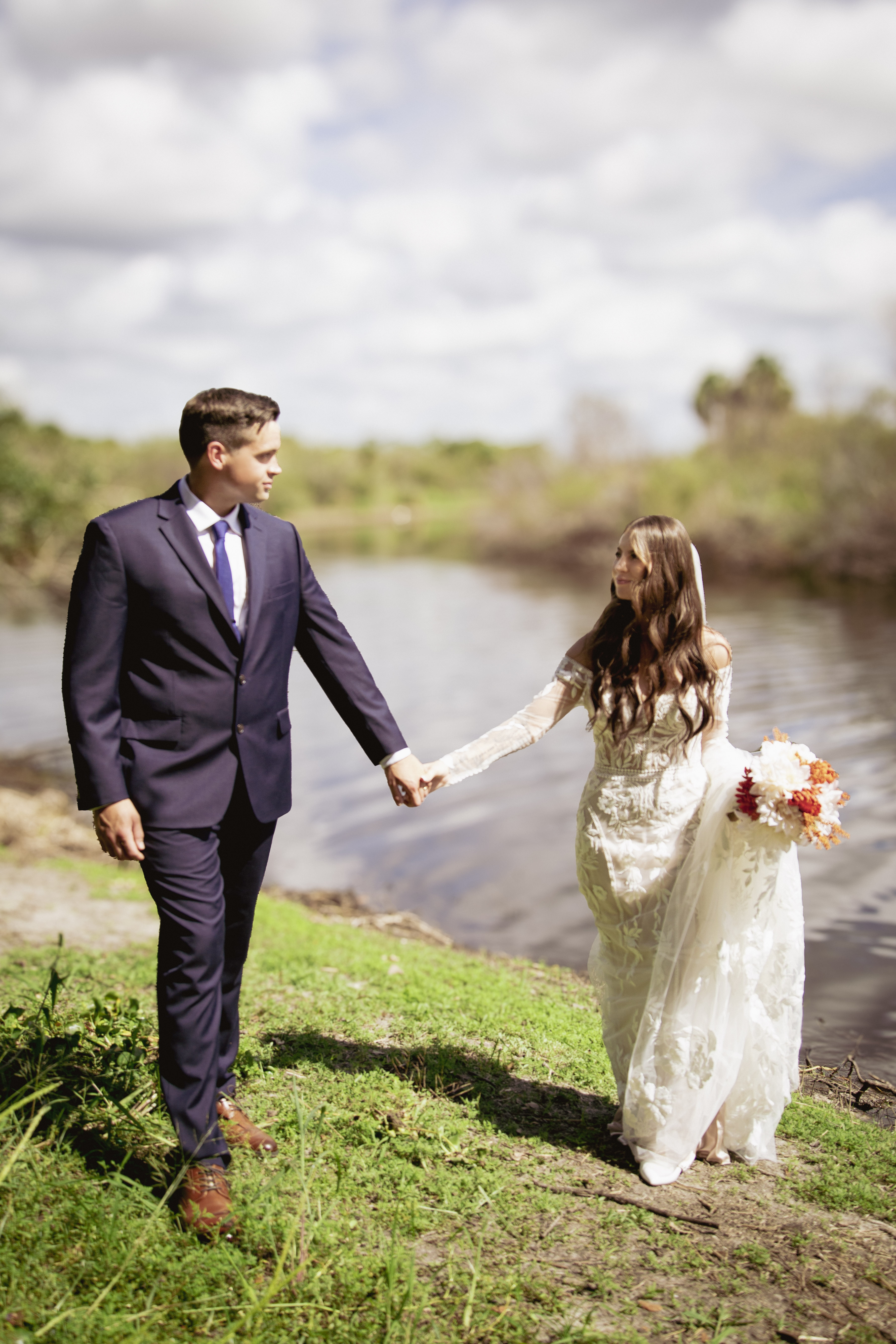 Person using a pen to cross a task off a productivity paper card.
