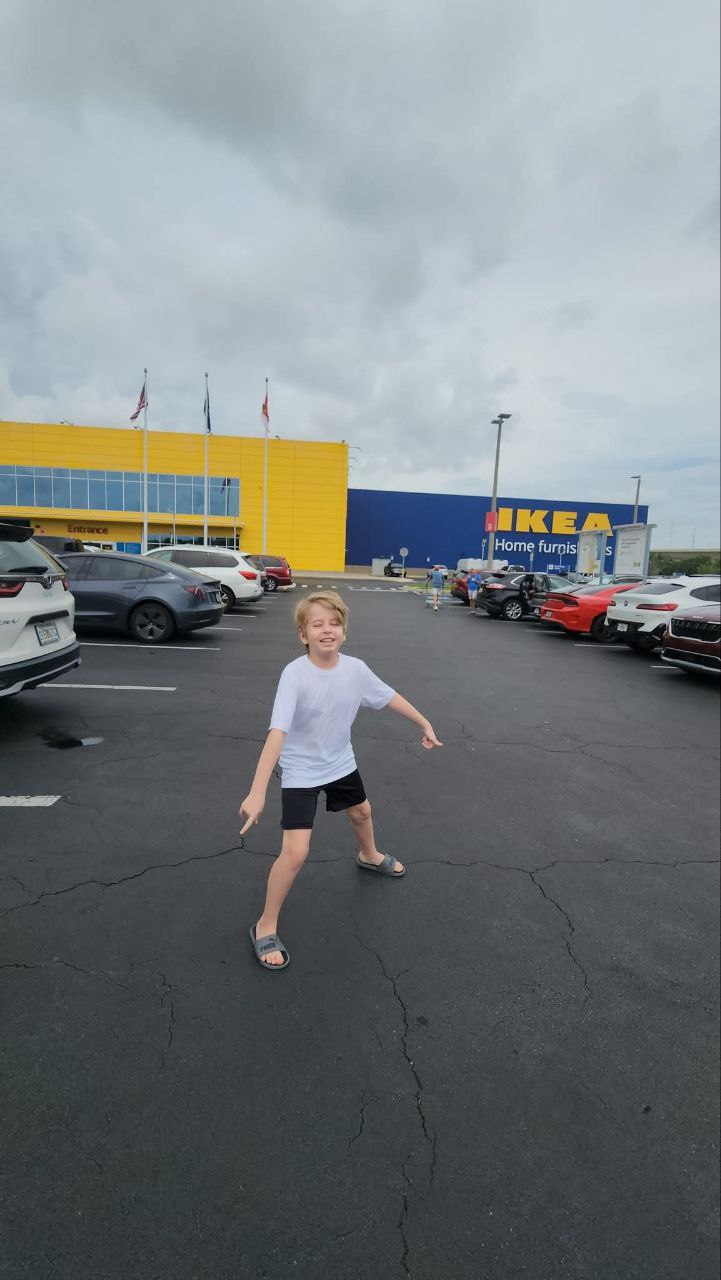 Model wearing plain gray basic tee.