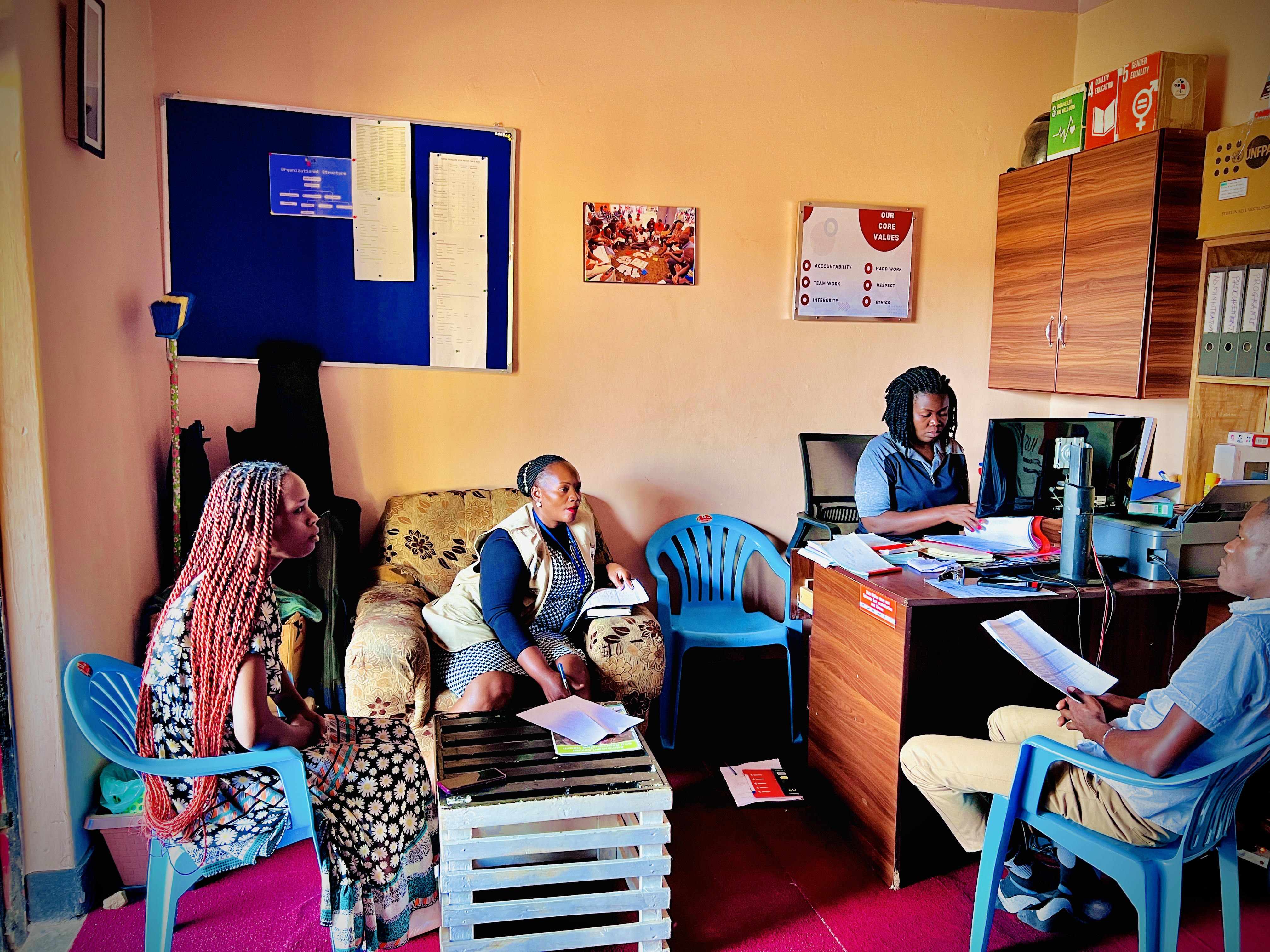 Olive drab green insulated bottle with flared screw lid and flat top.