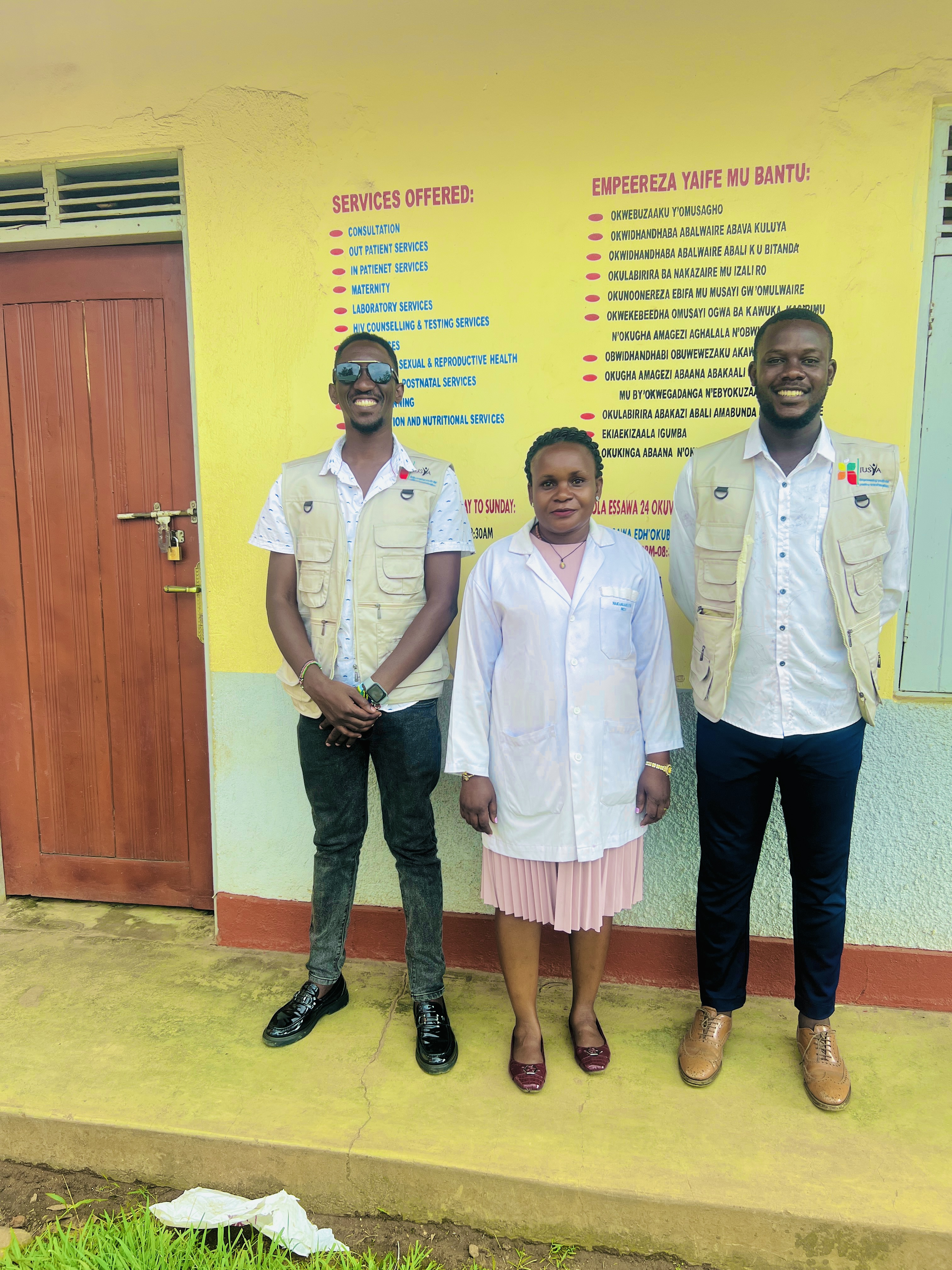 Two each of gray, white, and black shirts laying flat.