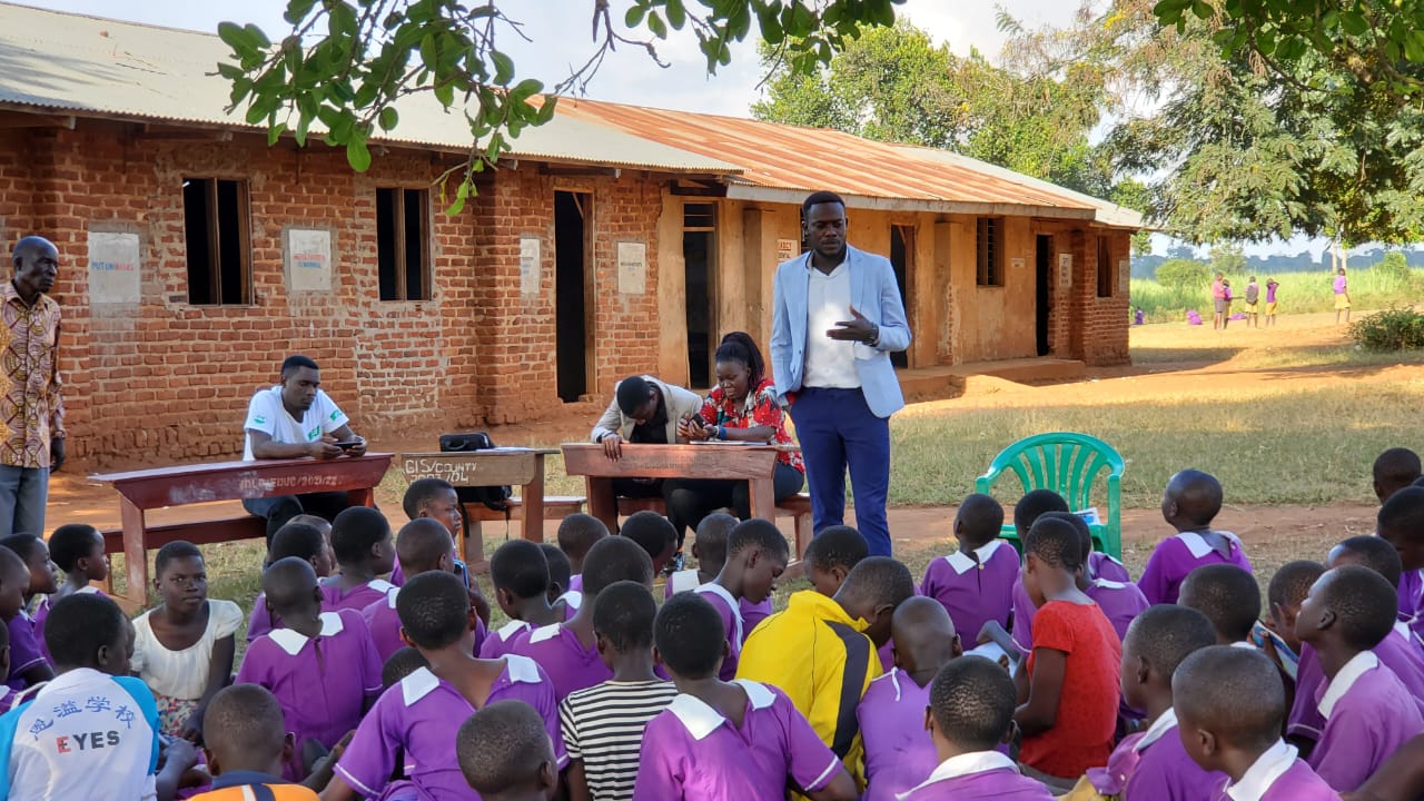 Olive drab green insulated bottle with flared screw lid and flat top.