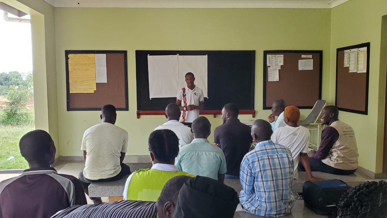 Tall slender porcelain bottle with natural clay textured body and cork stopper.
