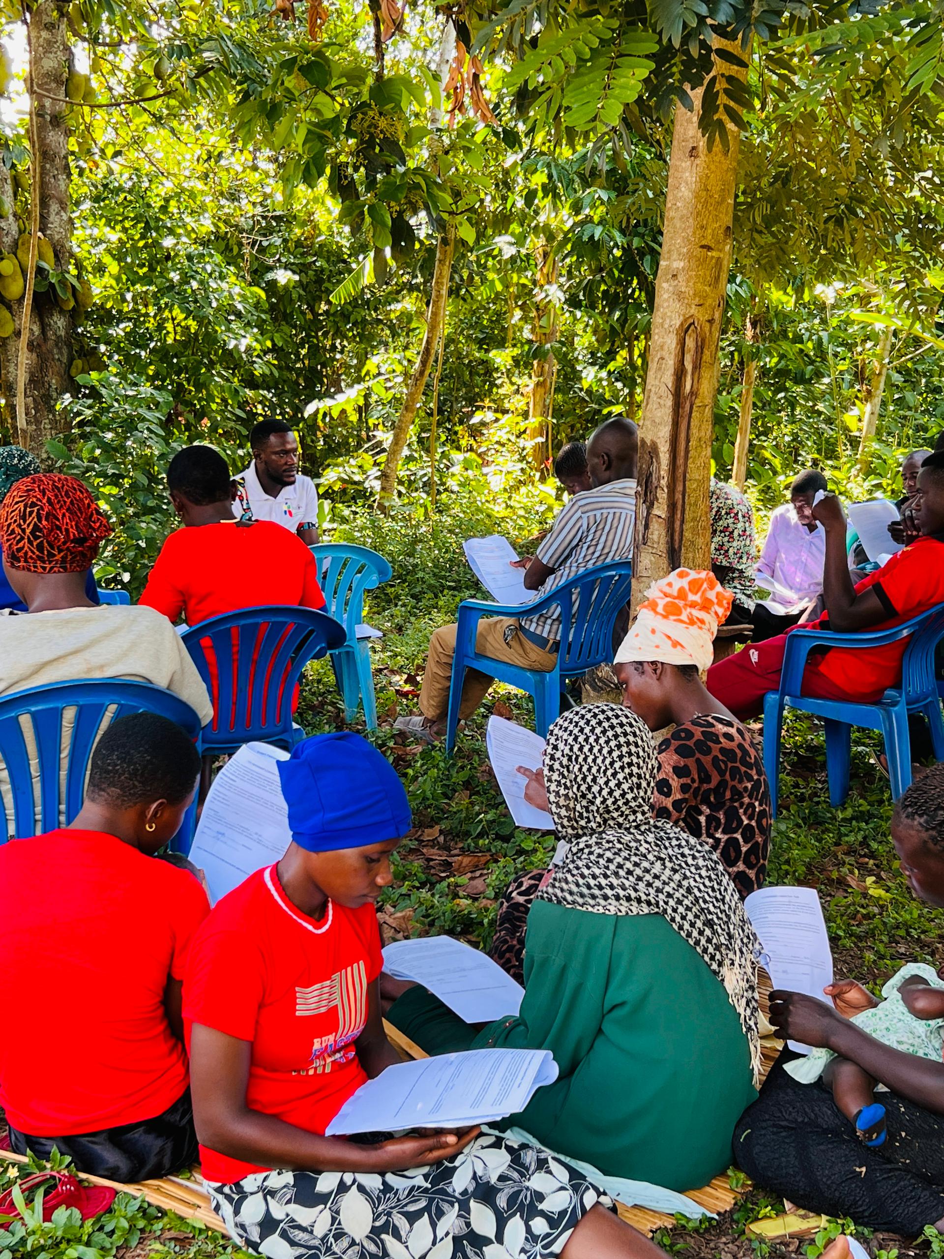 Hand holding black machined steel mechanical pencil with brass tip and top.