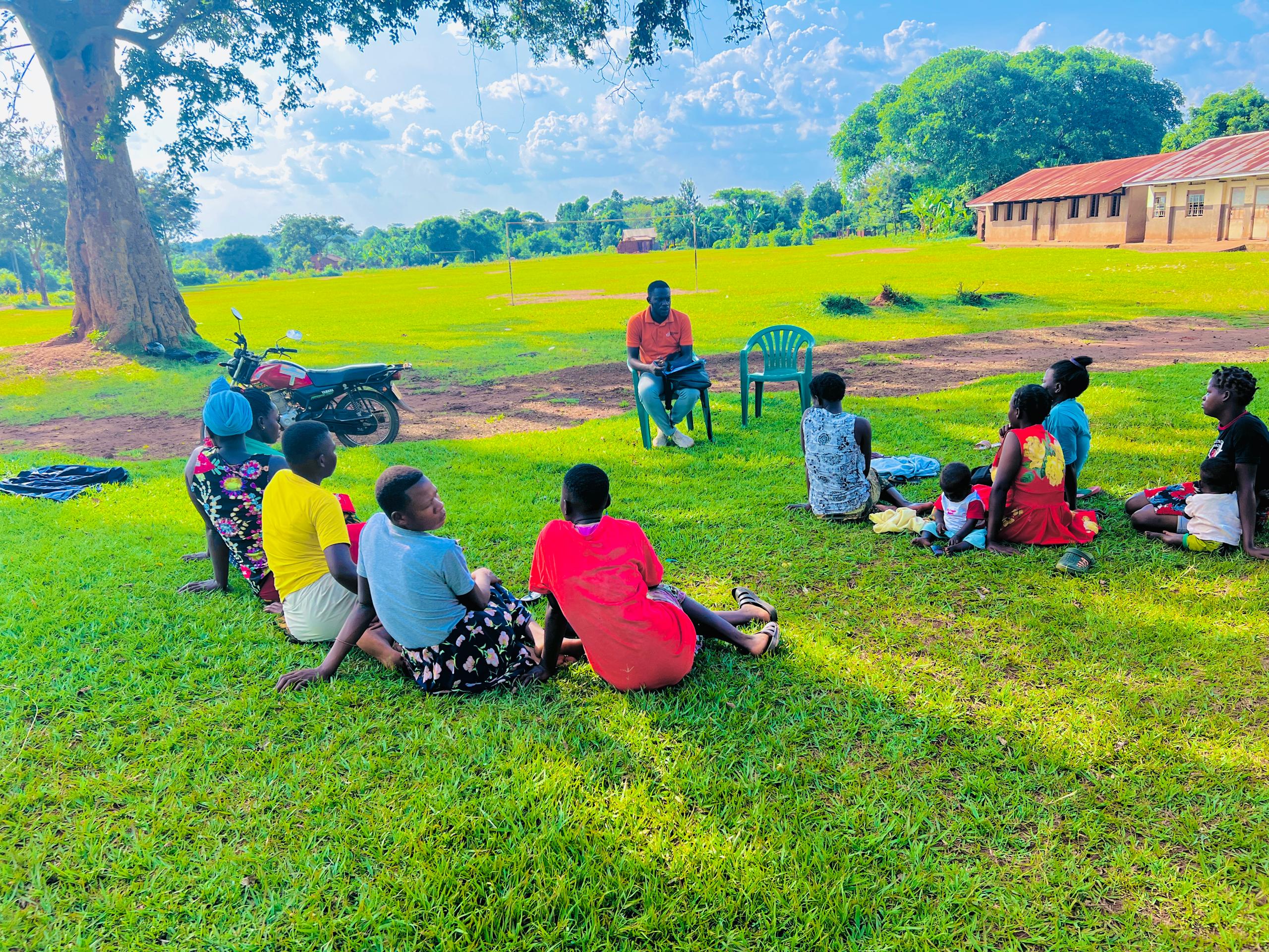 Tall slender porcelain bottle with natural clay textured body and cork stopper.