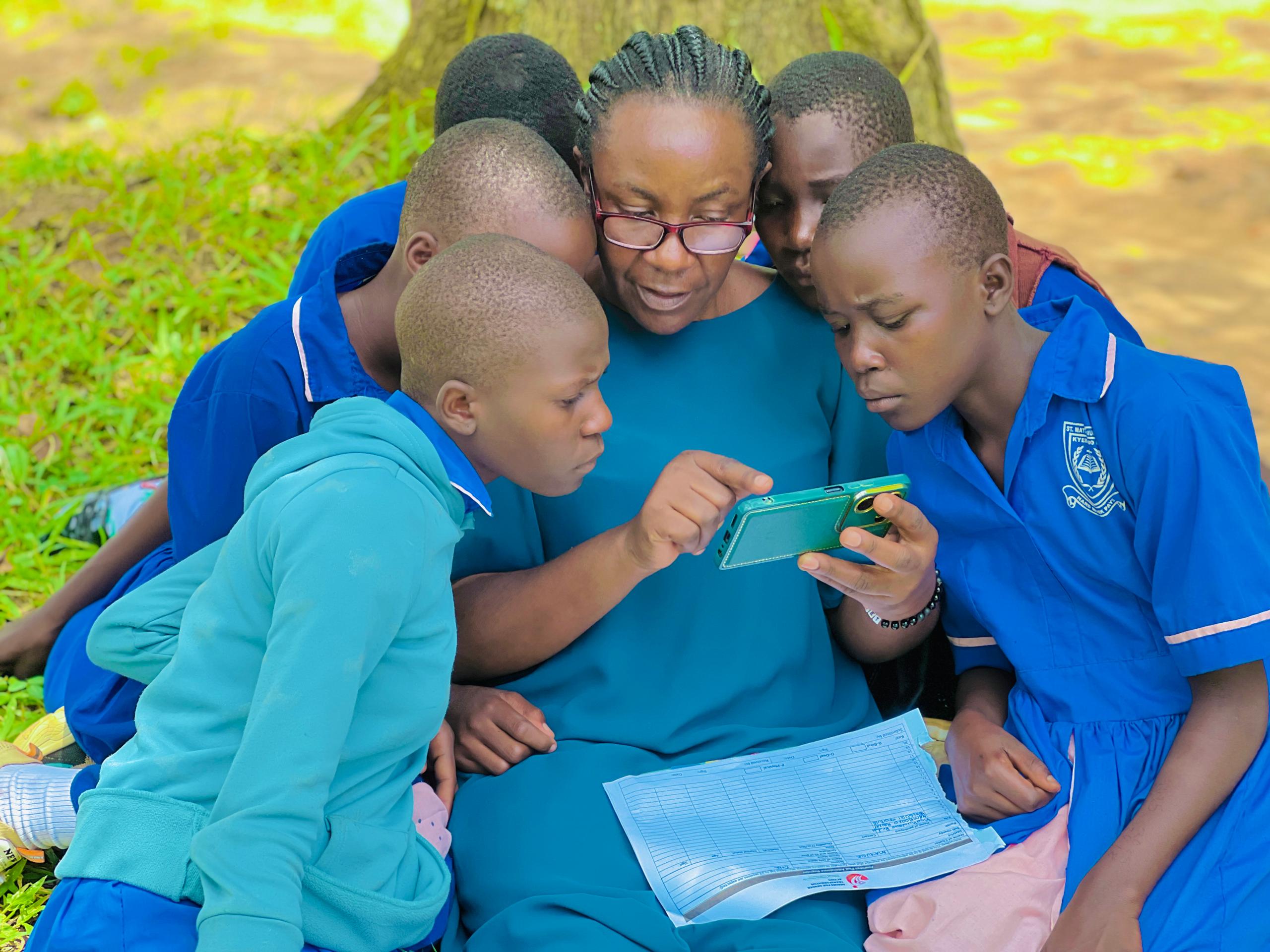Olive drab green insulated bottle with flared screw lid and flat top.