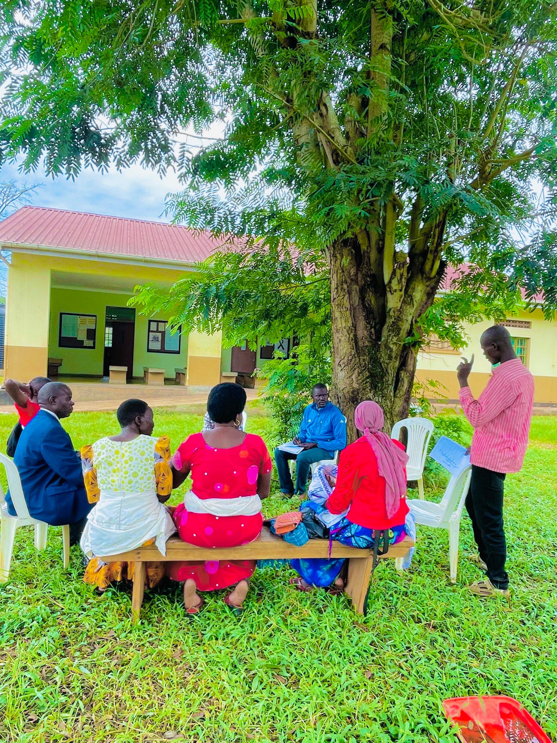 Hand holding black machined steel mechanical pencil with brass tip and top.