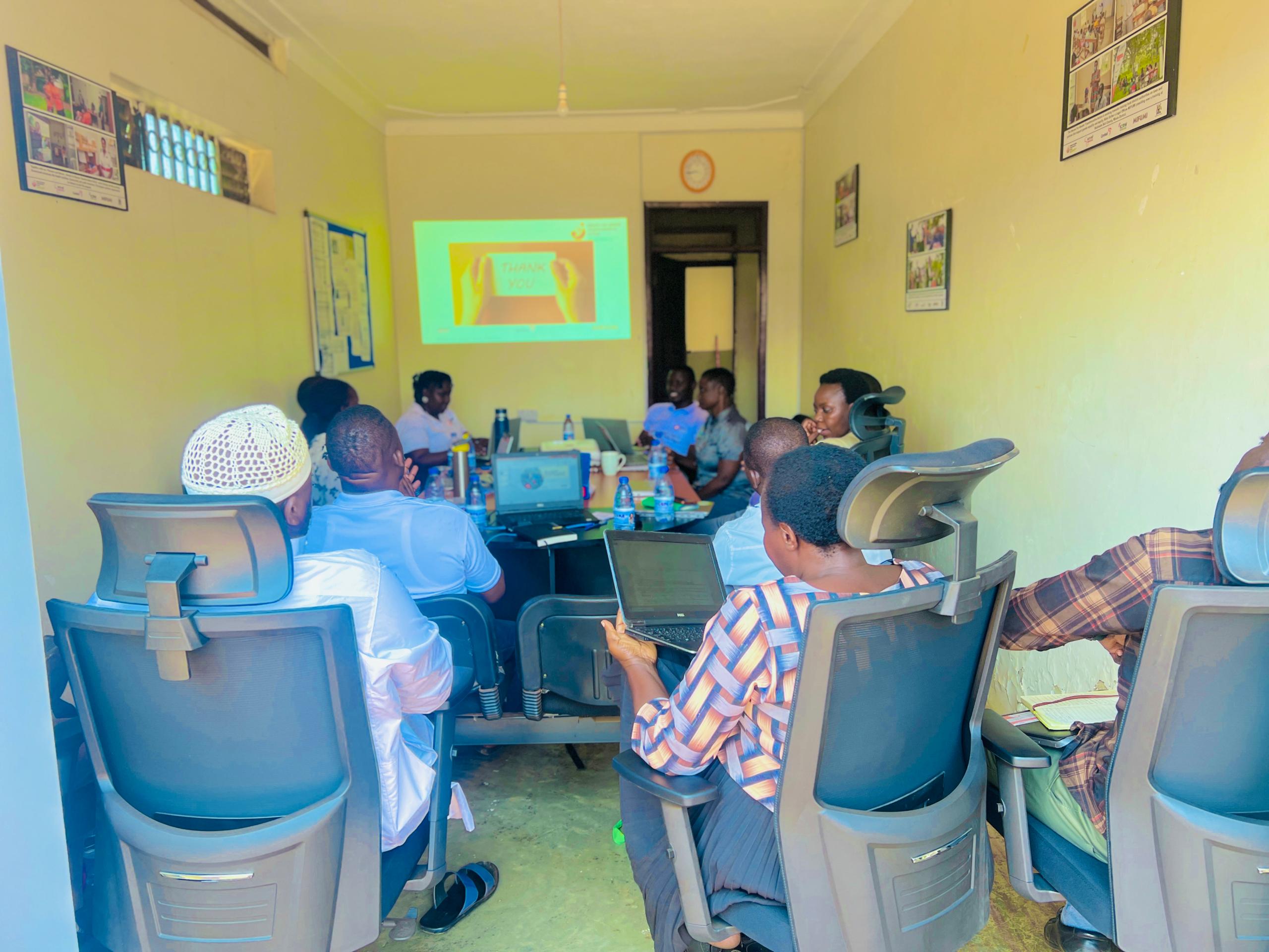 Olive drab green insulated bottle with flared screw lid and flat top.