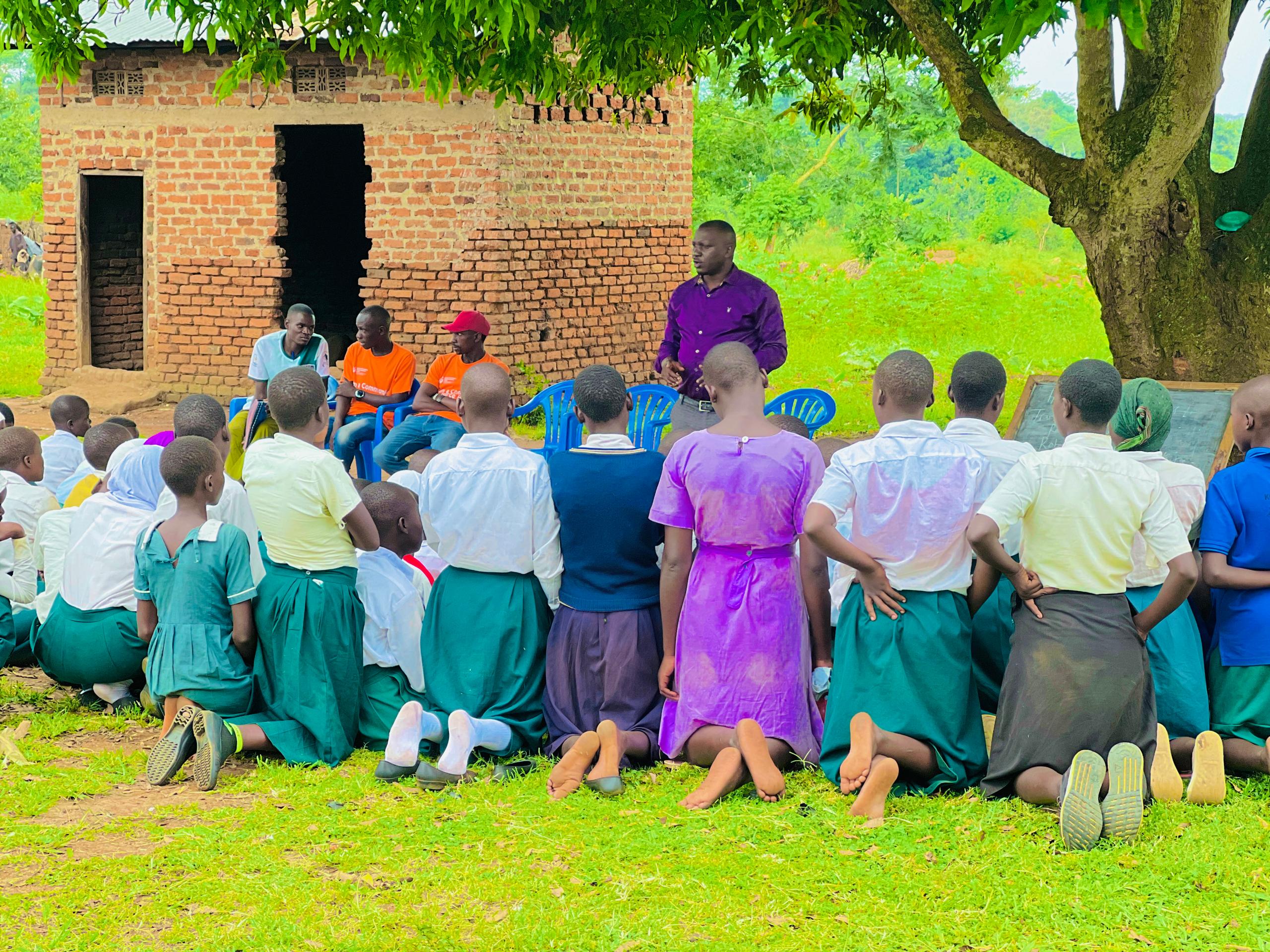 Olive drab green insulated bottle with flared screw lid and flat top.