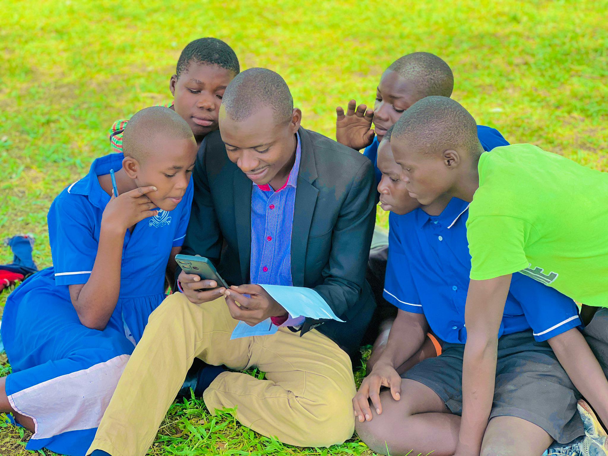 Olive drab green insulated bottle with flared screw lid and flat top.
