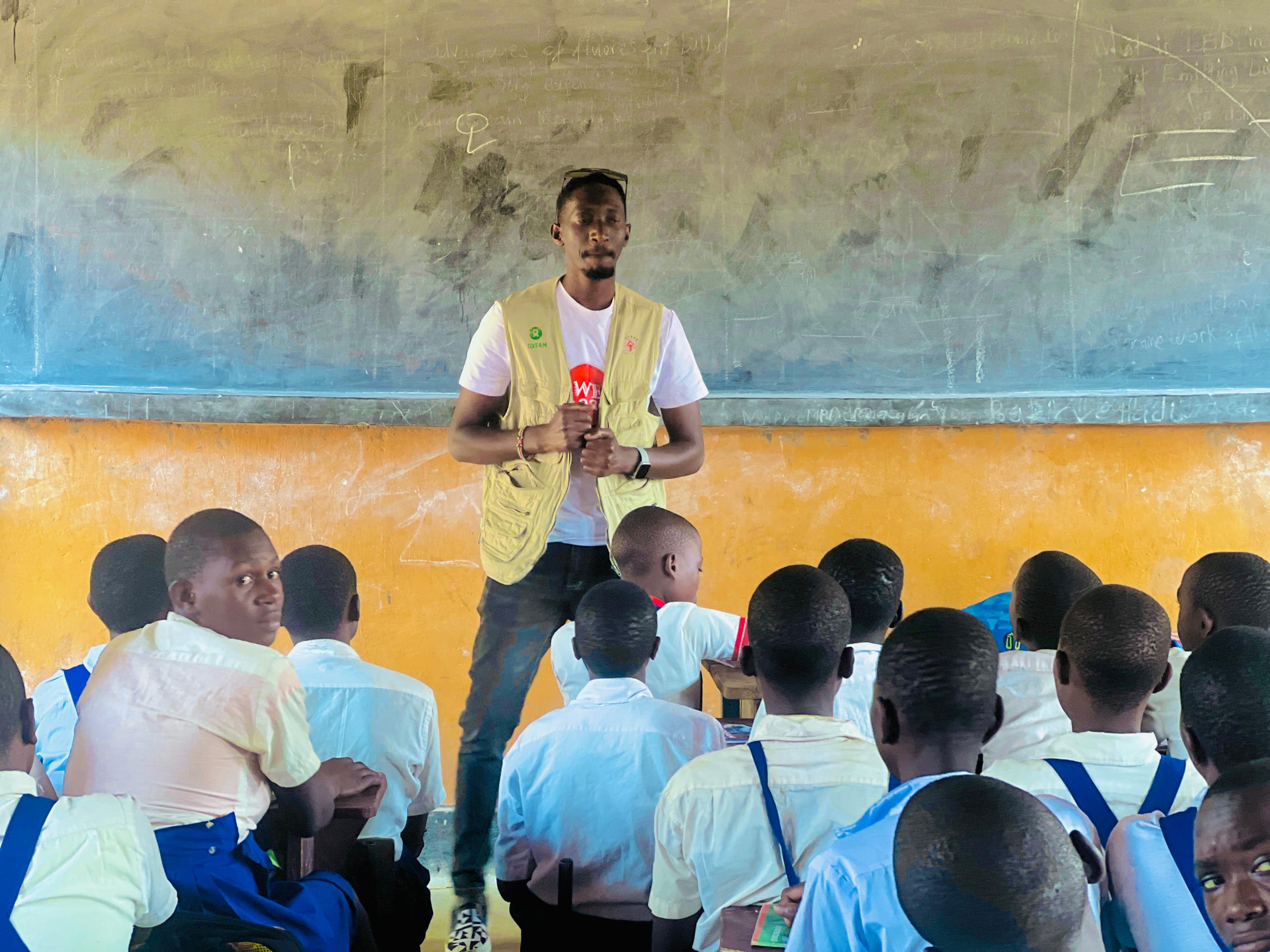 Olive drab green insulated bottle with flared screw lid and flat top.