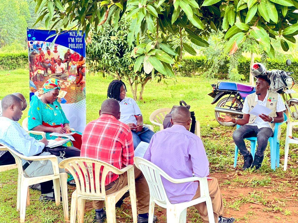 Olive drab green insulated bottle with flared screw lid and flat top.