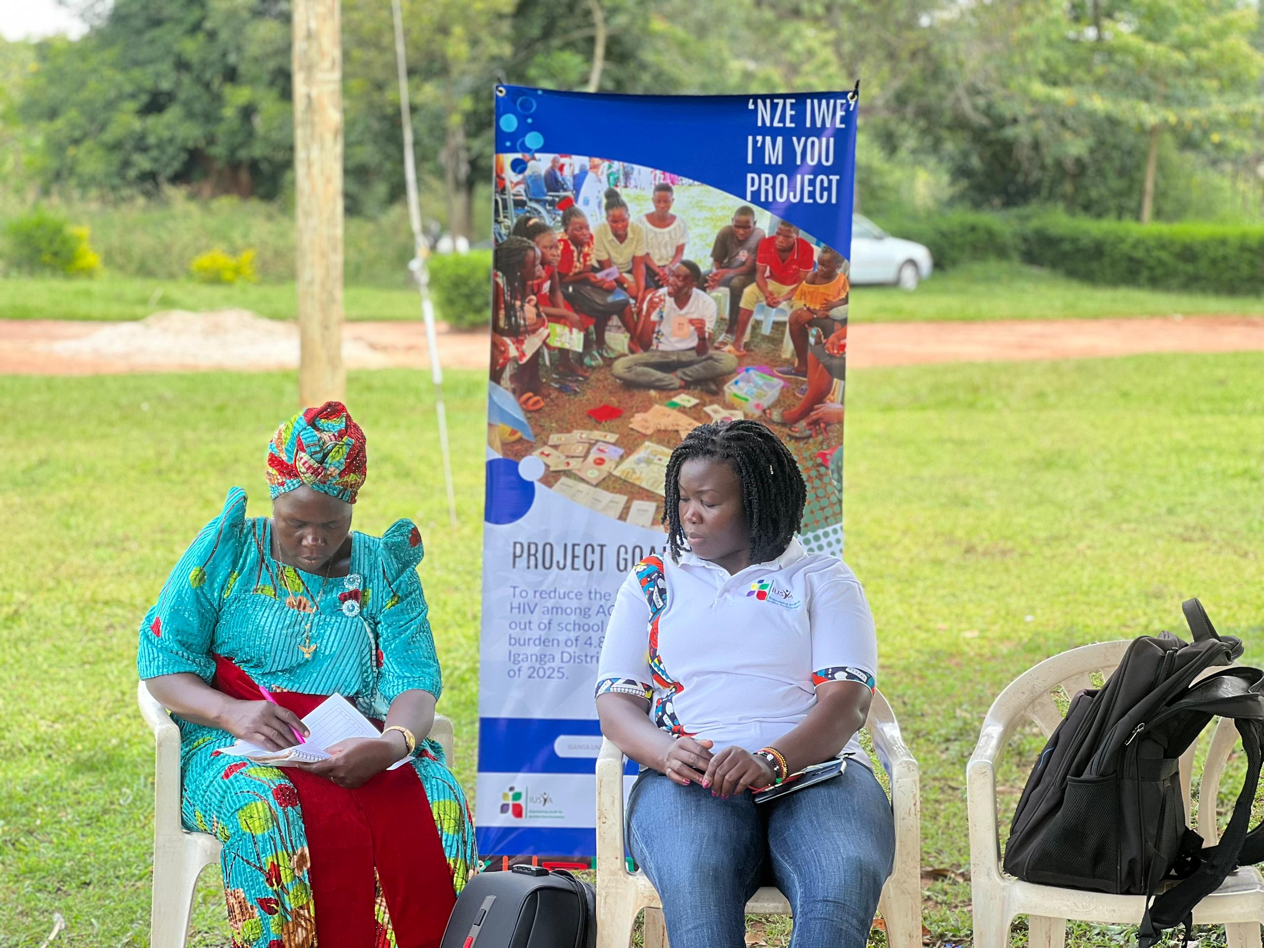 Person using a pen to cross a task off a productivity paper card.