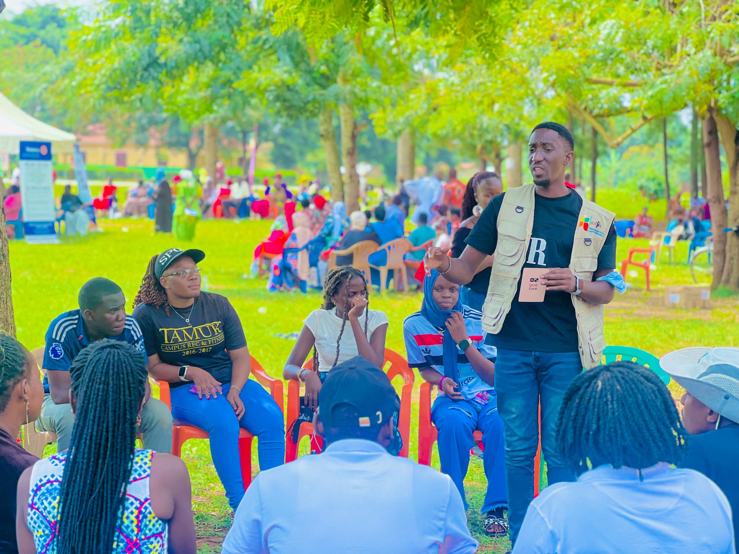Person using a pen to cross a task off a productivity paper card.