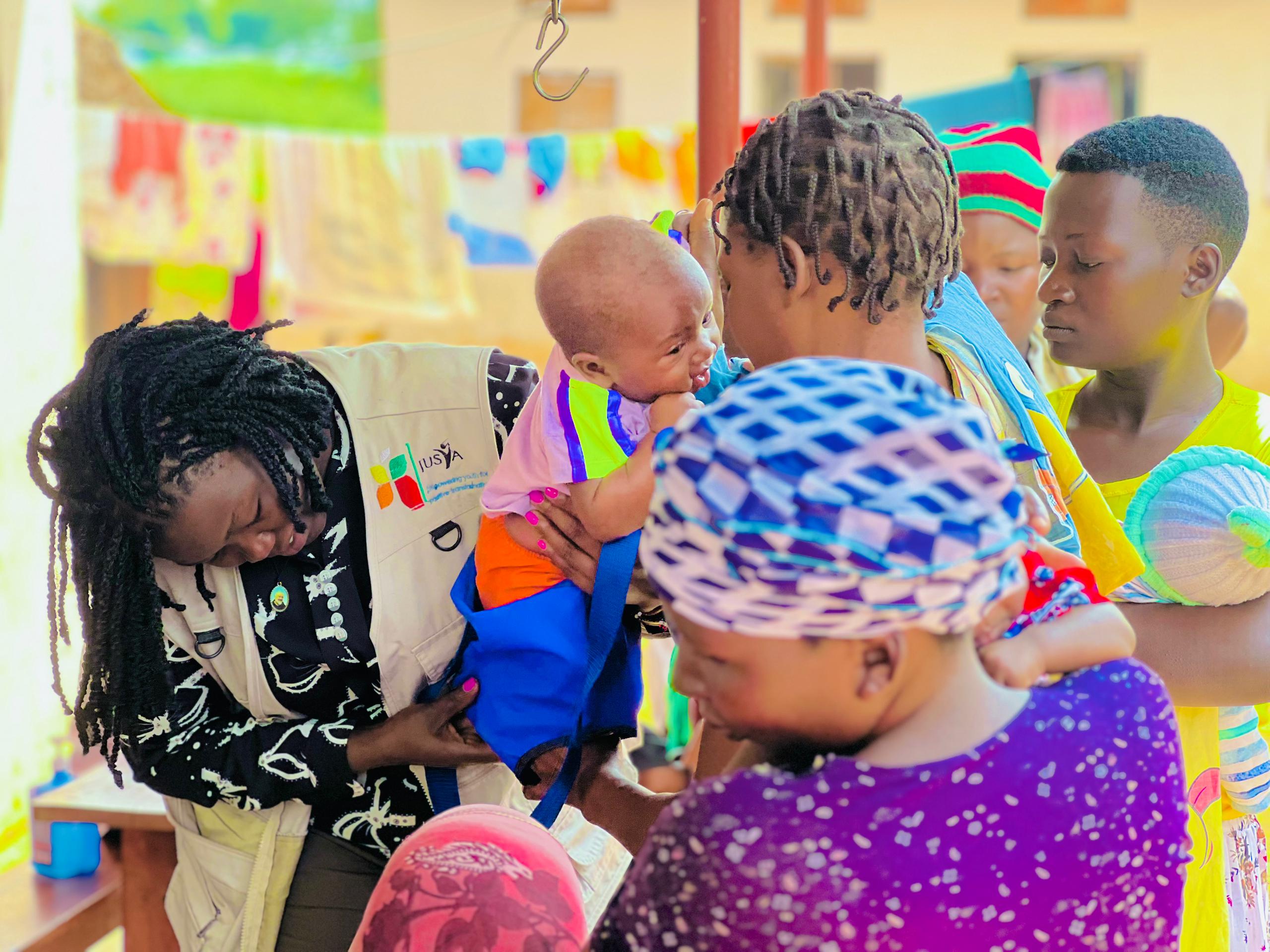 Olive drab green insulated bottle with flared screw lid and flat top.