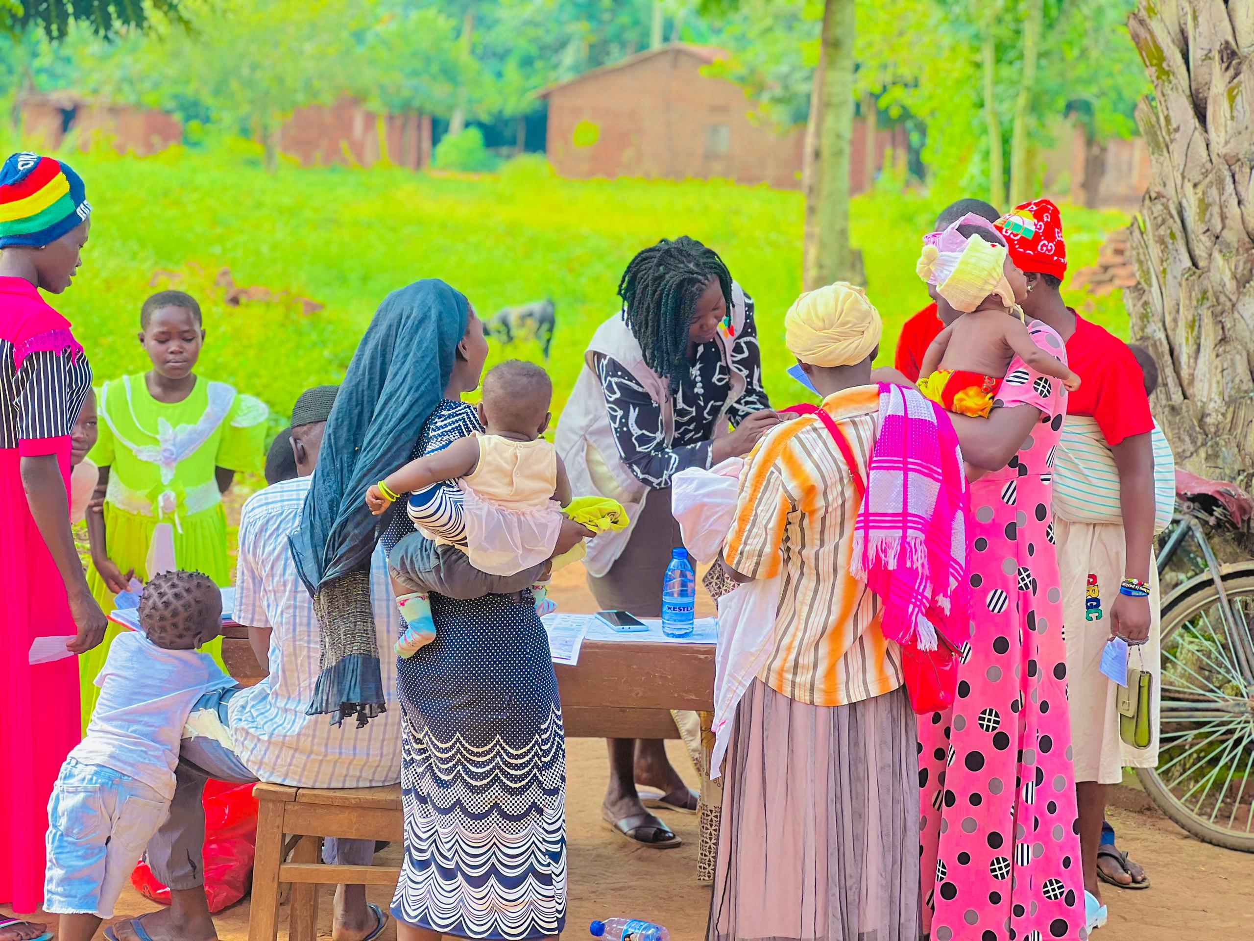 Person using a pen to cross a task off a productivity paper card.