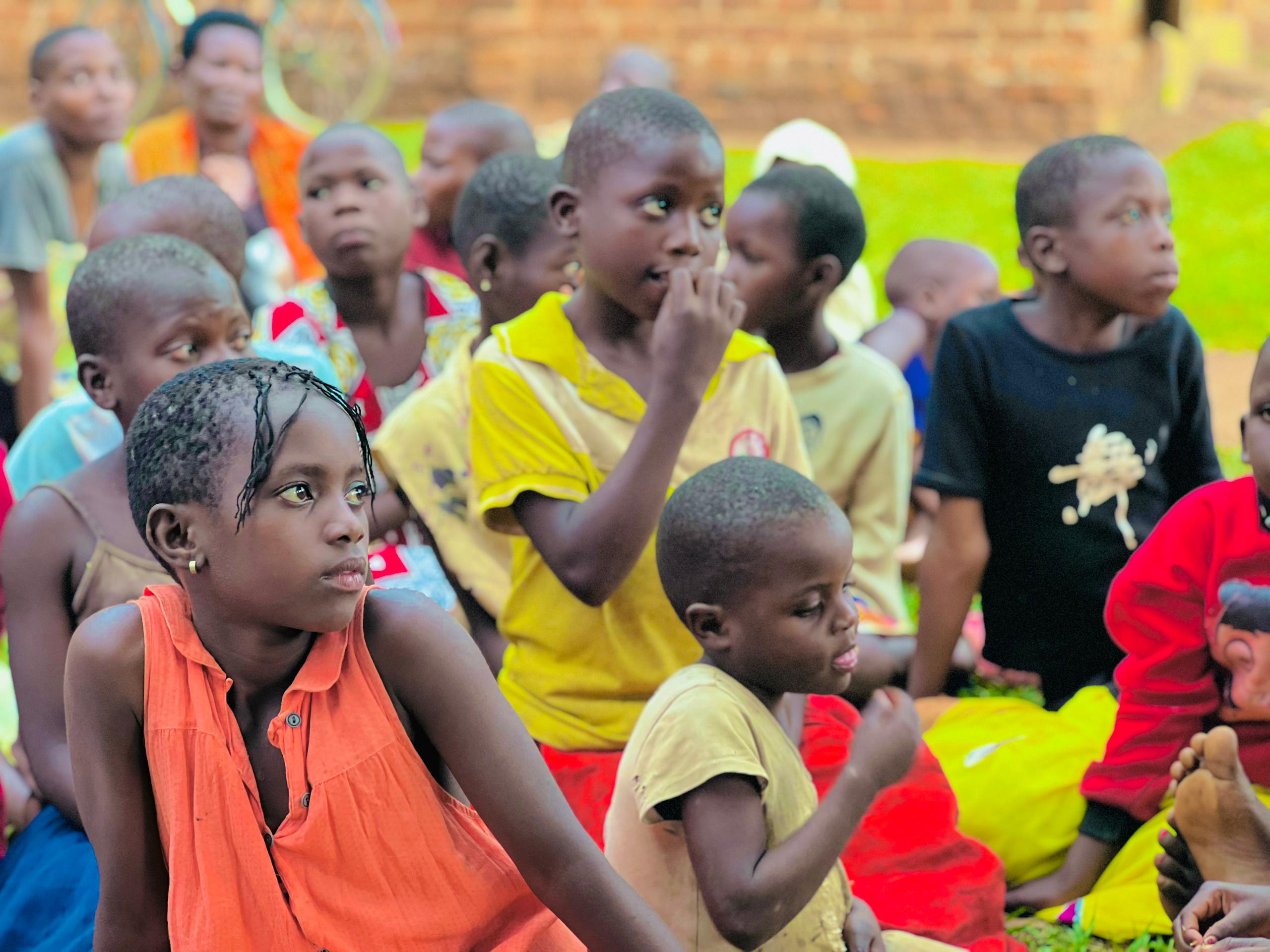 Hand holding black machined steel mechanical pencil with brass tip and top.