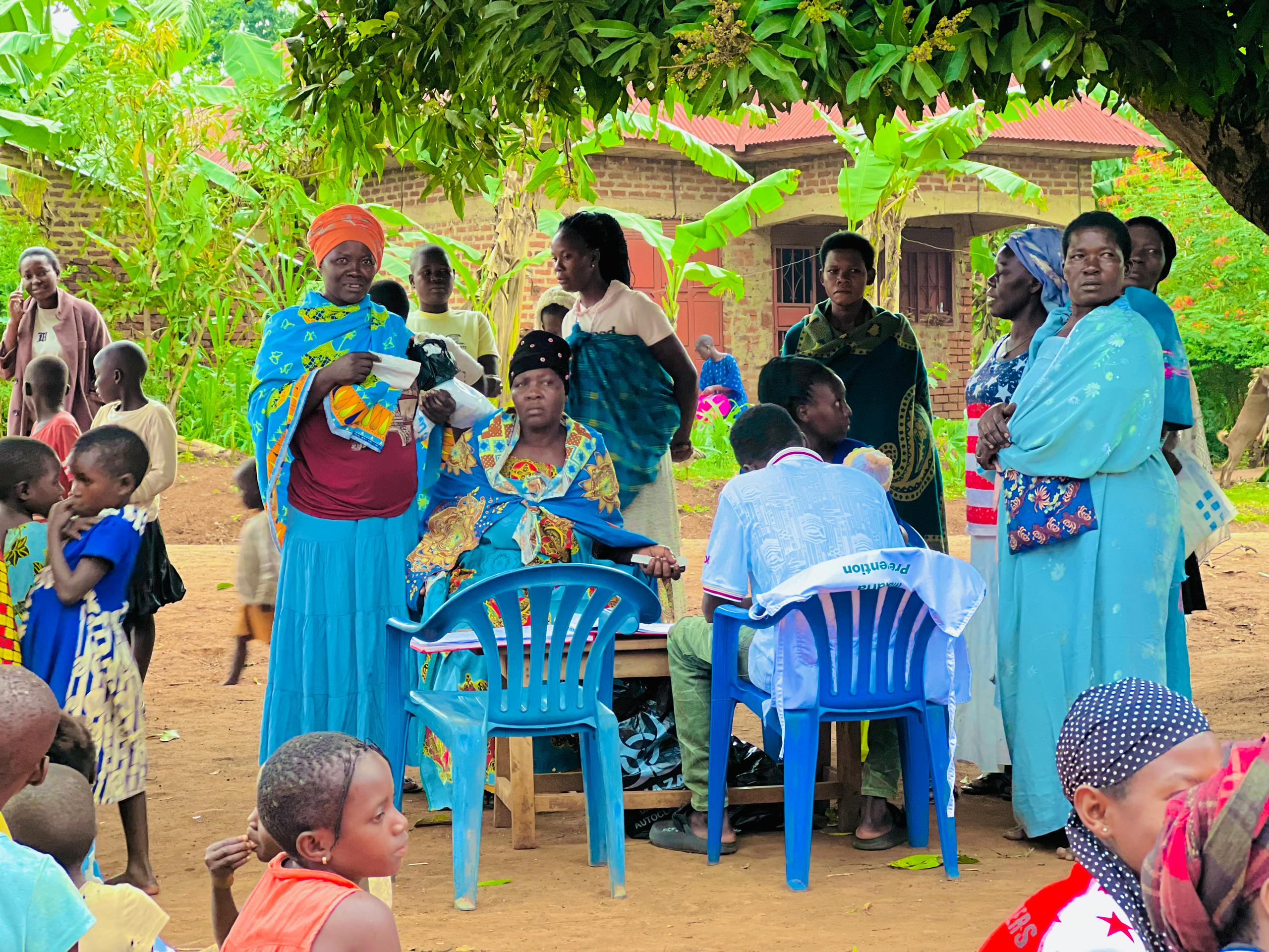 Hand holding black machined steel mechanical pencil with brass tip and top.