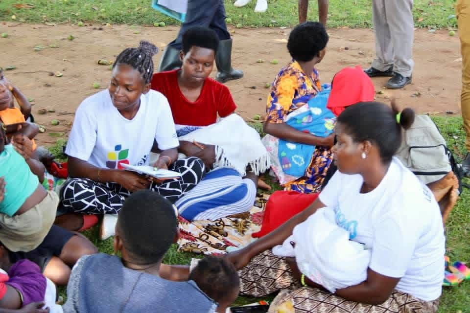 Olive drab green insulated bottle with flared screw lid and flat top.