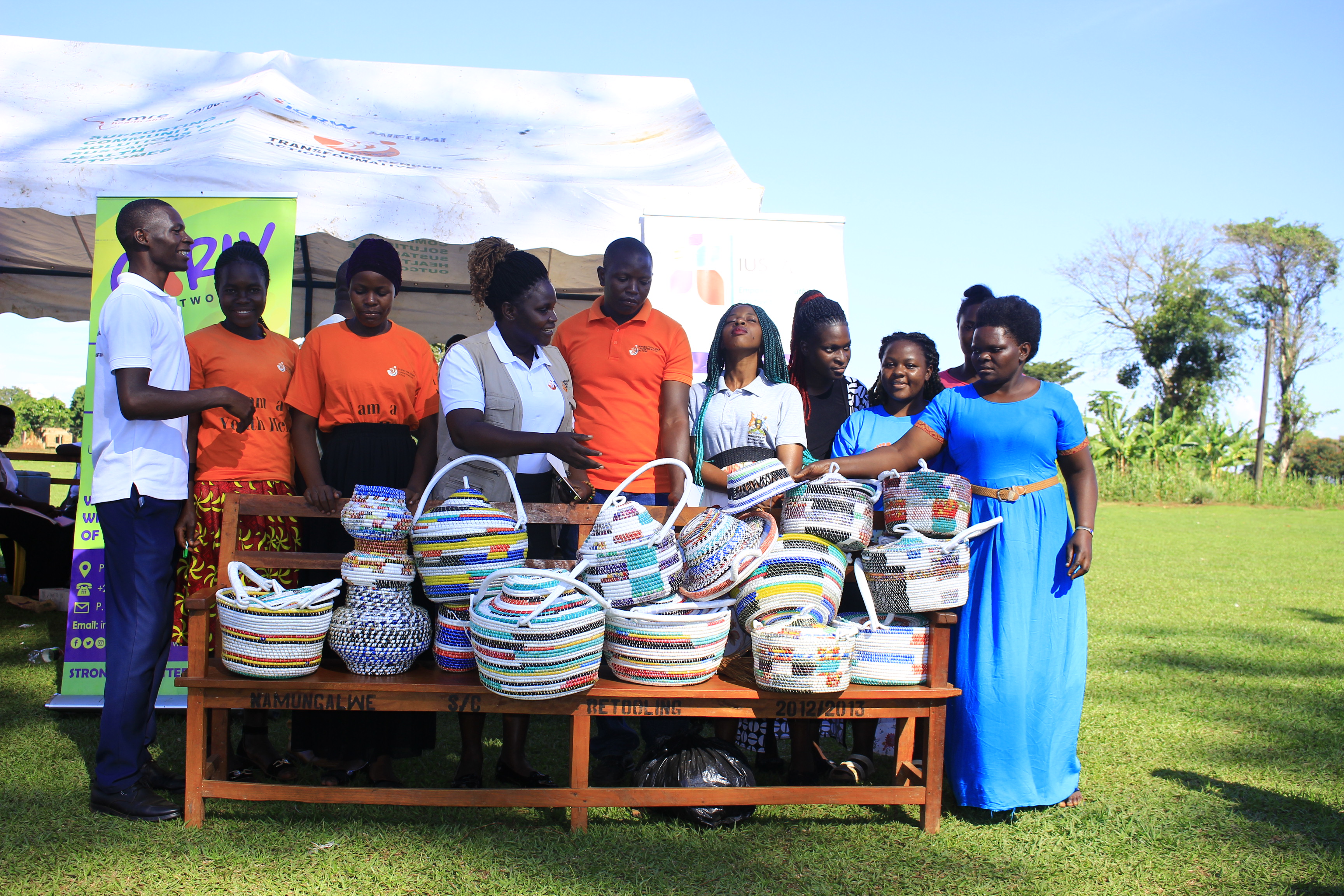 Person using a pen to cross a task off a productivity paper card.