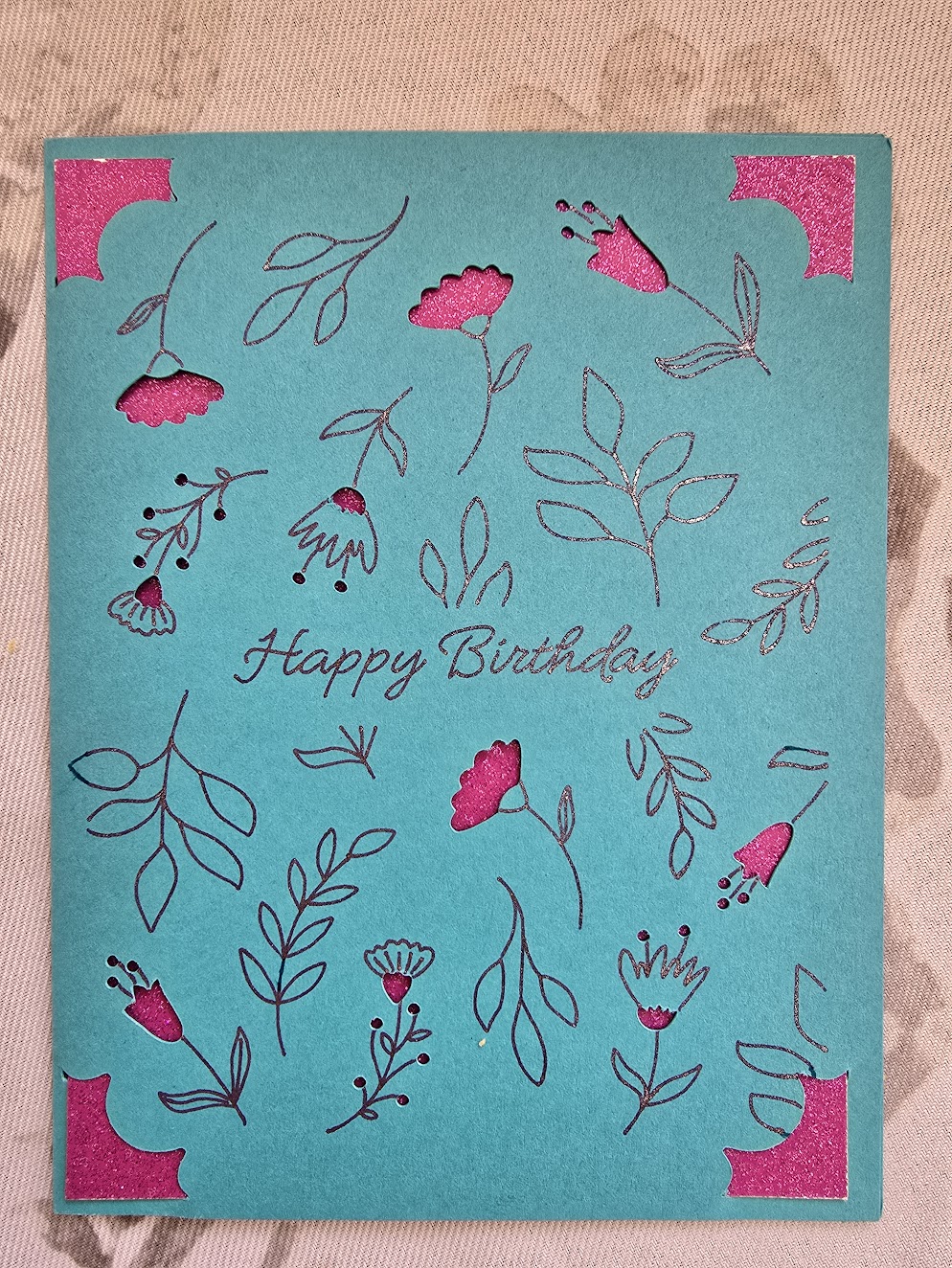 Tall slender porcelain bottle with natural clay textured body and cork stopper.