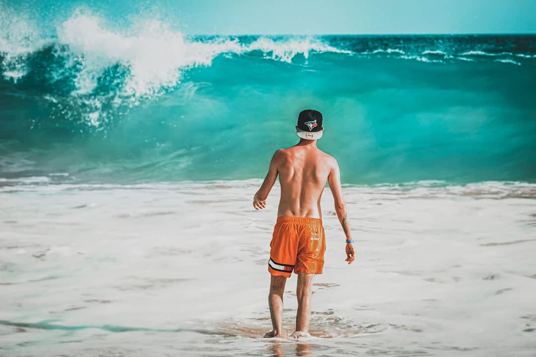 Kite surfer and big waves on the beach, Ponta Preta, Sal Cabo Verde - Cape Verde Islands in Africa, History, Guide and Tips - Photo by Katarzyna Urbanek | Cape Verde African Caribbean
