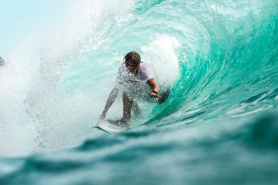 Surfer surfing Cape Verde islands – best surf spots to surf in Cape Verde on Holiday - Photo by Jeremy Bishop | Cape Verde African Caribbean