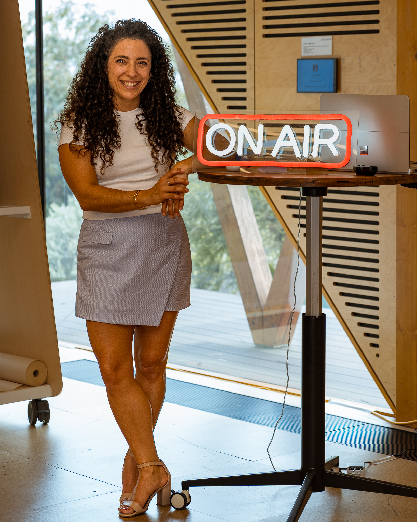 Jacinda Patty at the ON AIR sign