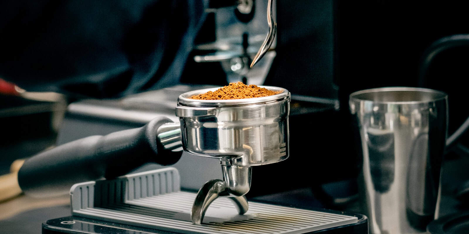 Espresso machine portafilter full of Beann artisan coffee grounds - beann speciality coffee