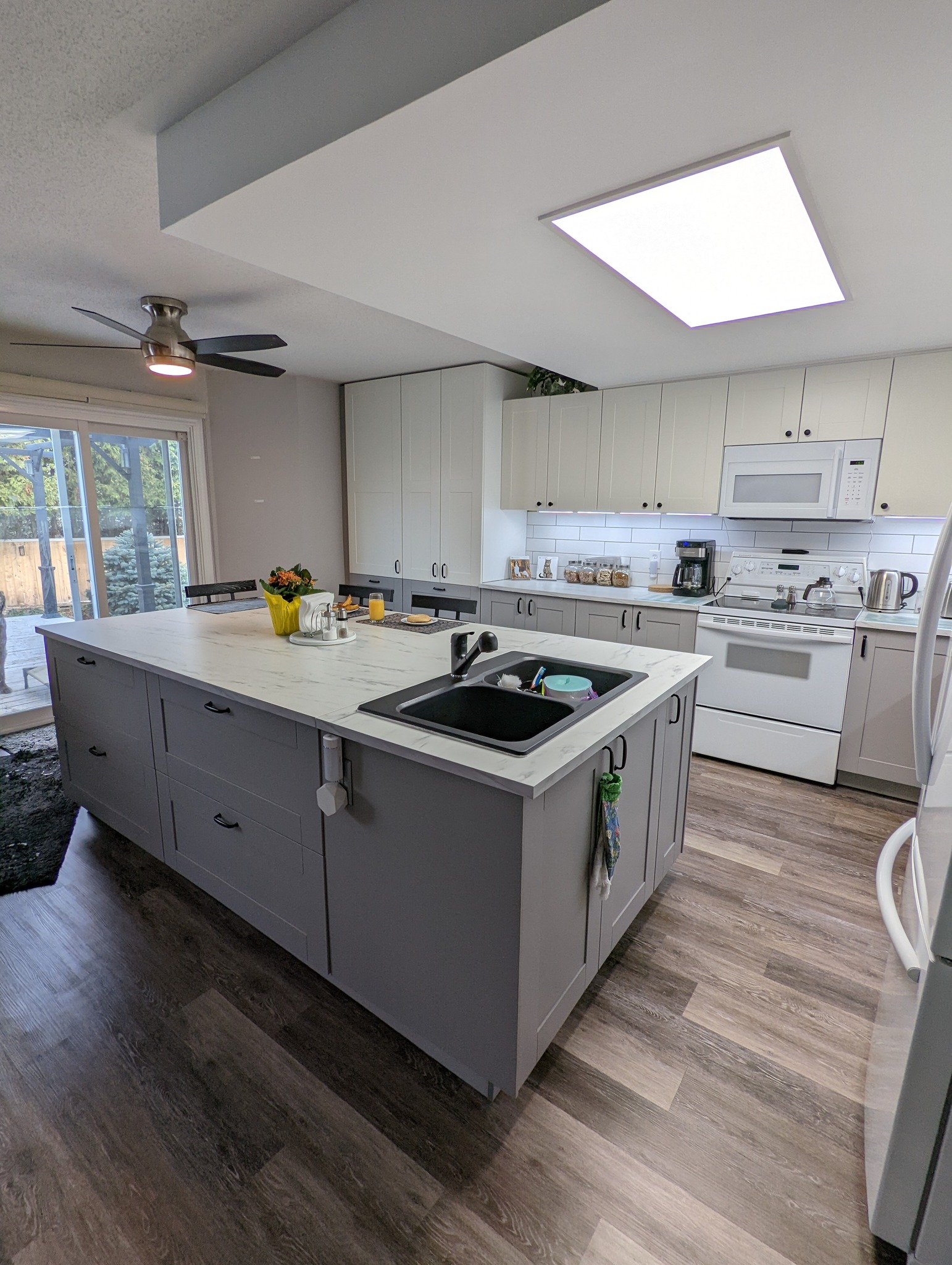 A newly renovated kitchen with a sleek modern design