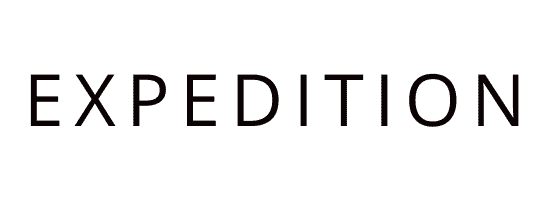 SUITCASEƎ Expedition Bags logo, representing durable and reliable travel gear for adventurous journeys