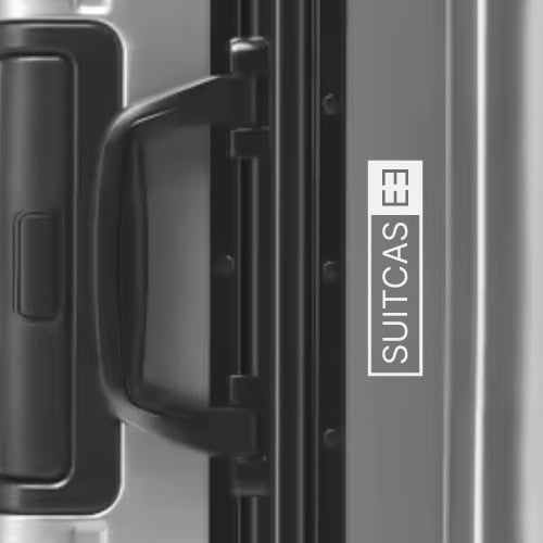 Gunmetal grey Origin 4 Series Aluminium medium check-in Suitcase and hold luggage top view and branding detail