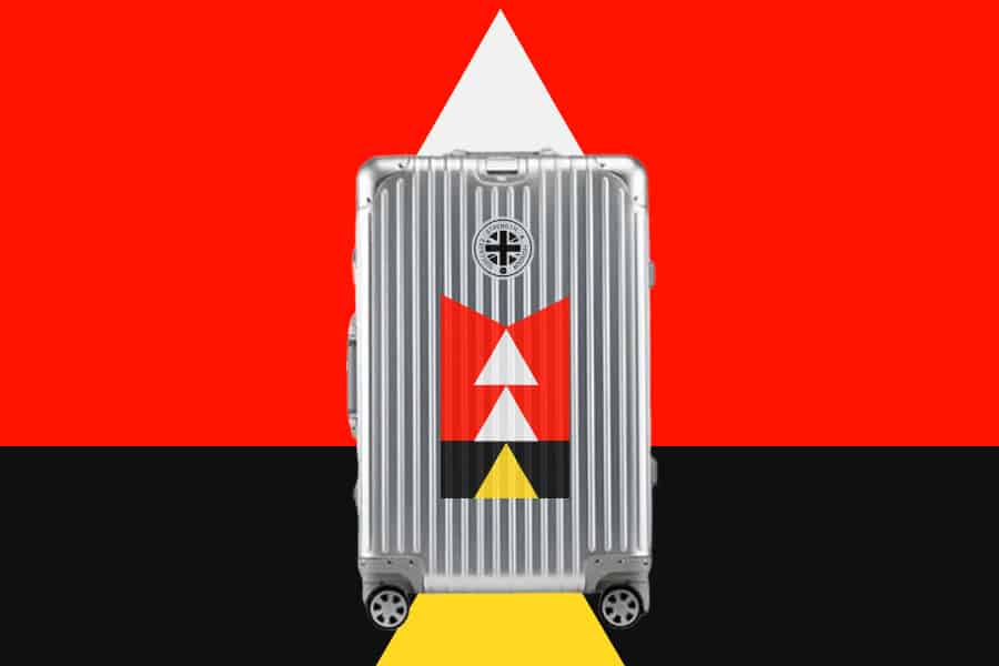 SUITCASEƎ Trip Series Rapa Nui Red Aluminium Carry-On Suitcase, merging durability with stunning artwork inspired by Easter Island.