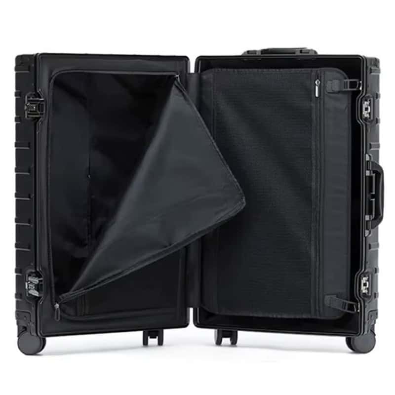 Open Black SUITCASEƎ Origin Origin 4 medium check-in suitcase, luxury aluminium design hold luggage with organised storage compartments.