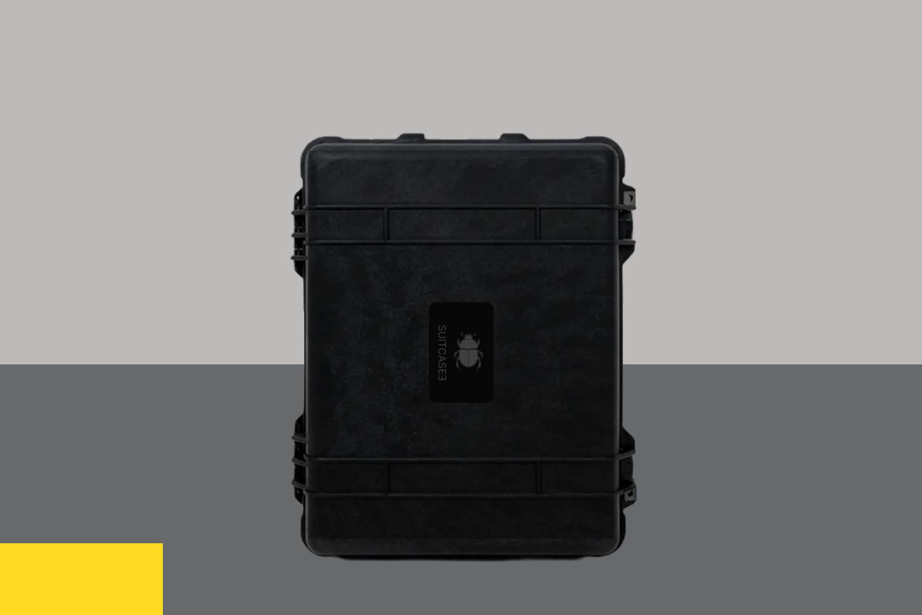 Black SUITCASEƎ Icon Medium Check-In Suitcase, waterproof and TSA-approved rolling luggage, for secure travel and protection of your belongings.