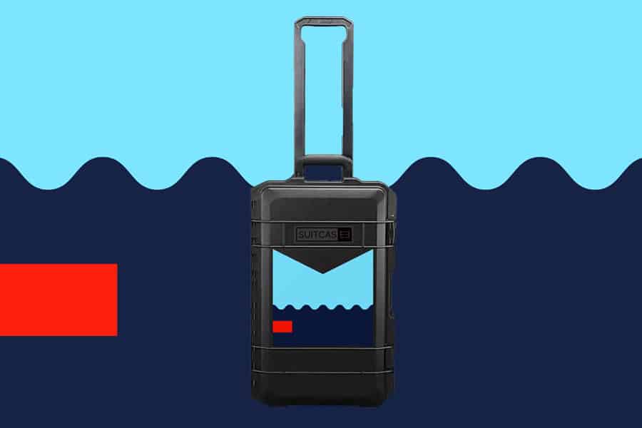 SUITCASEƎ Expedition Series Biarritz Blue Waterproof hard shell Carry-On Suitcase in black, blending durability with stunning Atlantic wave design.