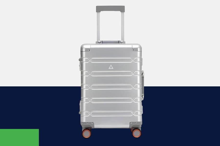 SUITCASEƎ Origin 3 Aluminium Large Check-In suitcase in silver, with smooth-rolling wheels and durable, travel luggage design.
