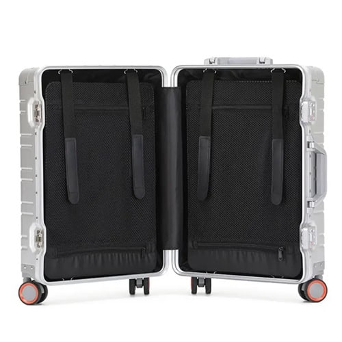 Open Silver SUITCASEƎ Origin 3 Large Check-In suitcase, luxury aluminium design with organised storage compartments.