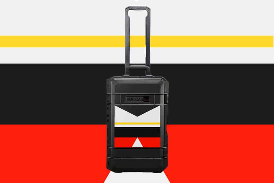 SUITCASEƎ Expedition Series La Palma Red waterproof carry-on suitcase with smooth rolling and vibrant La Palma Volcano artwork.