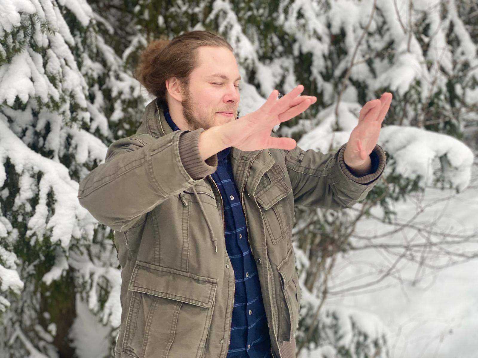 Olive drab green insulated bottle with flared screw lid and flat top.