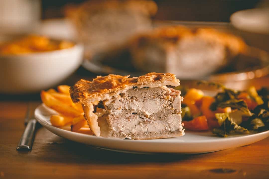 Pub food in Castle Combe Village Pie chips and veg photo unsplash | Castle Combe Village, North Wiltshire, UK England