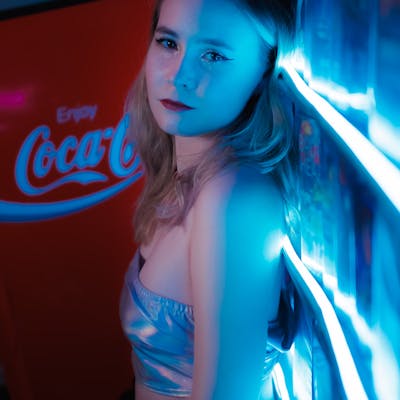 Olive drab green insulated bottle with flared screw lid and flat top.