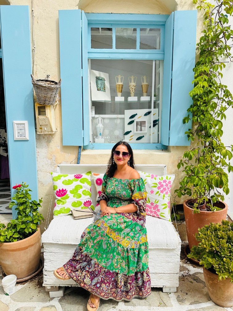 Meghna Patel by blue shutters in Mykonos